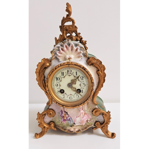 349 - LATE 19th CENTURY FRENCH POTTERY MANTLE CLOCK
with gilt metal mounts and of waisted form around a ci... 