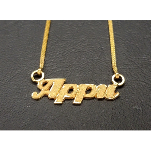 66 - TWENTY-TWO CARAT GOLD NECKLACE 
the box chain attached to the name plate of 'Appu' at both sides wit... 