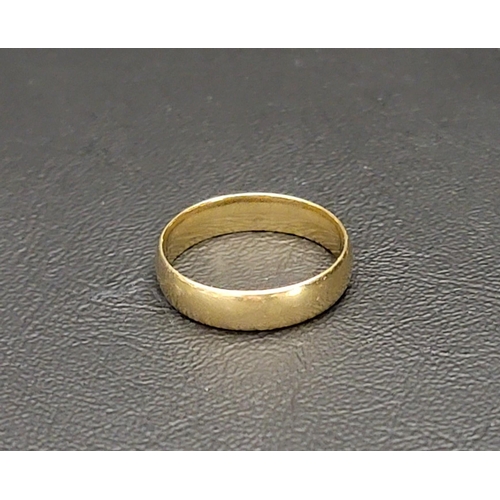 74 - EIGHTEEN CARAT GOLD BAND
approximately 5.8 grams and ring size U