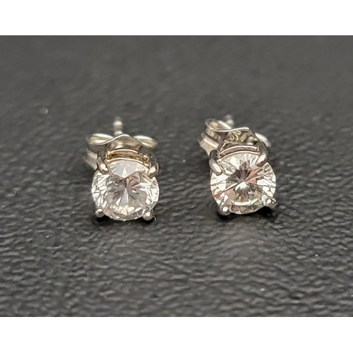 84 - PAIR OF DIAMOND STUD EARRINGS
the round brilliant cut diamonds on each approximately 0.4cts (0.8cts ... 