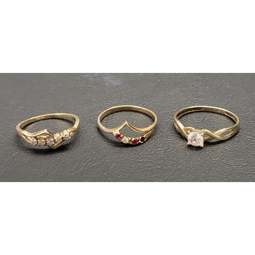 86 - THREE GOLD STONE SET RINGS 
comprising an unmarked gold diamond set ring with a geometric design, a ... 