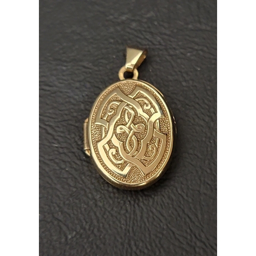 87 - NINE CARAT GOLD LOCKET PENDANT
with entwined Celtic motif decoration, total weight approximately 2 g... 