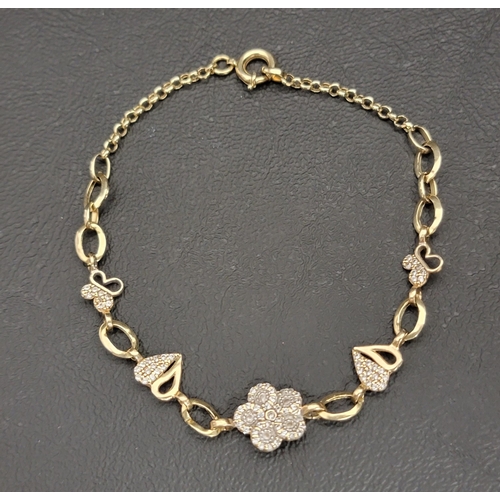 107 - FOURTEEN CARAT GOLD CZ SET BRACELET
the chain bracelet interspersed with pierced stone set butterfli... 