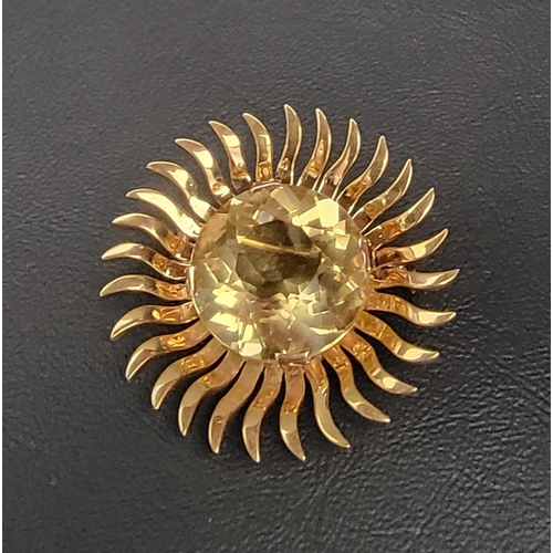 116 - ATTRACTIVE CITRINE SET FLOWER HEAD/SUNBURST DESIGN BROOCH
in unmarked high carat gold, the central r... 