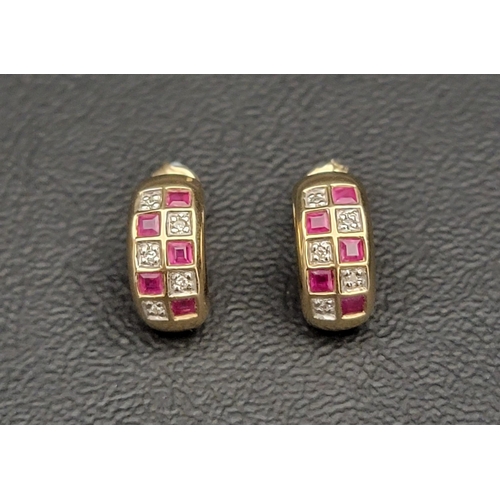 123 - PAIR OF RUBY AND DIAMOND CLUSTER EARRINGS
the gemstones in checkerboard effect setting, in nine cara... 