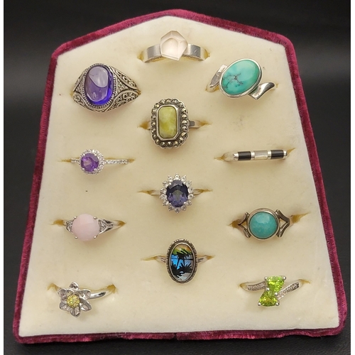 139 - SELECTION OF TWELVE SILVER RINGS
including turquoise and other stone set rings, gem set examples and... 