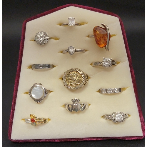 140 - SELECTION OF TWELVE SILVER RINGS
including various CZ set examples, a silver gilt sovereign style ri... 