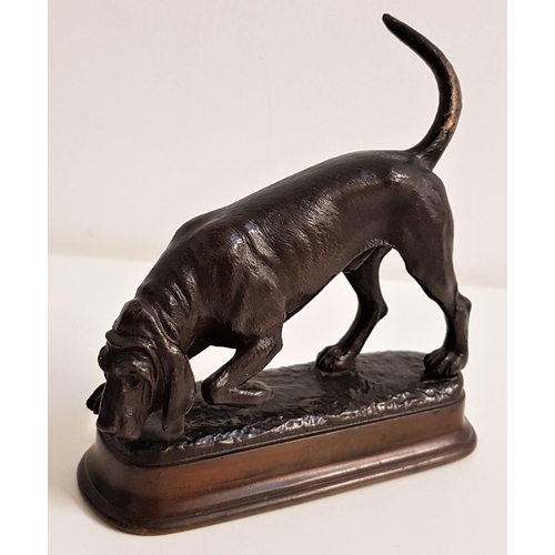 324 - CHARLES CURRY
bronze study of a bloodhound on a naturalistic base, signed, 13.5cm high