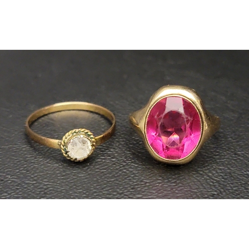 156 - TEN CARAT GOLD DRESS RING
set with faceted ruby coloured glass, ring size I-J and approximately 2.6 ... 