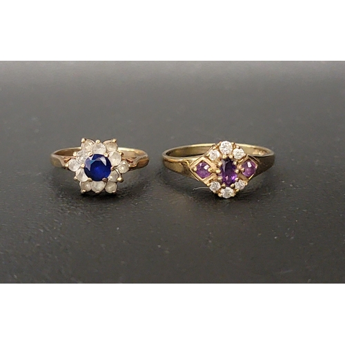 153 - TWO GEM SET NINE CARAT GOLD CLUSTER RINGS
one set with Amethyst and CZ and the other sapphire and CZ... 