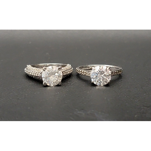 161 - TWO CZ SET DRESS RINGS
one in fourteen carat gold, ring size G and approximately 3.8 grams; and the ... 