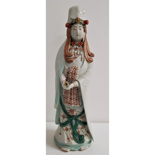 267 - LARGE JAPANESE PORCELAIN FIGURE OF KANNON
dressed in flowing robes and holding a scroll in both hand... 