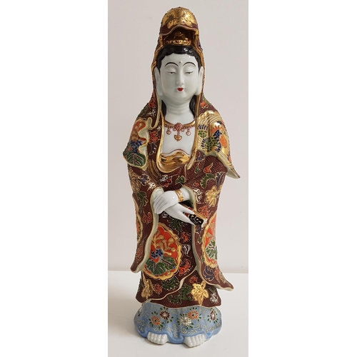 268 - LARGE JAPANESE PORCELAIN SATSUMA FIGURE OF KANNON
dressed in flowing robes, with her hands crossed a... 