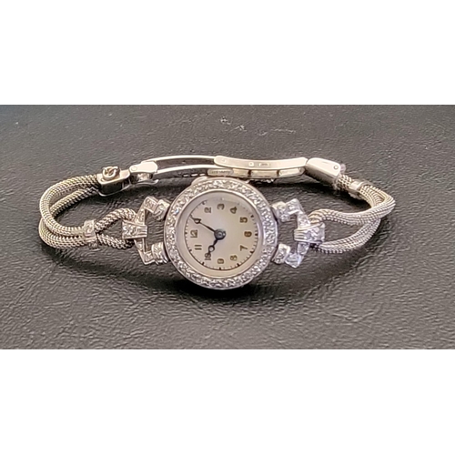 78 - ART DECO DIAMOND SET PLATINUM CASED COCKTAIL WATCH
the dial with Arabic numerals, with Swiss made fi... 