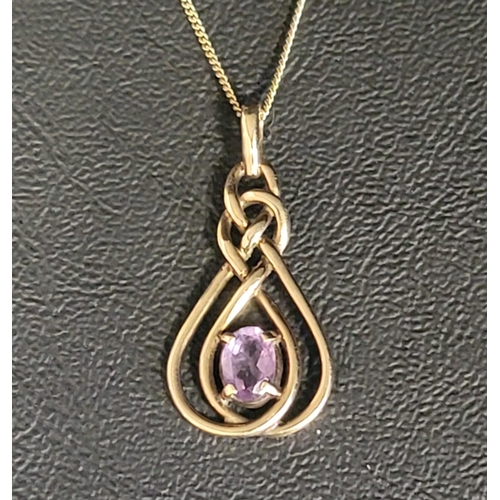 98 - AMETHYST SET NINE CARAT GOLD PENDANT
the central oval cut amethyst in pierced setting with entwined ... 