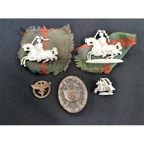 430 - WWII FIFE AND FORFAR YEOMANRY CAP BADGES
and a collar badge, WWII German wound badge and a WWII Germ... 