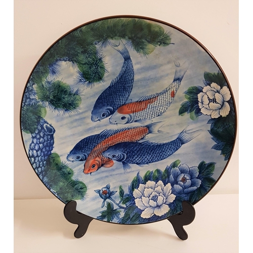 261 - LARGE JAPANESE CHARGER
decorated with carp and flowers, 41cm diameter