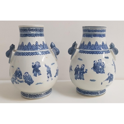 272 - PAIR OF CHINESE BLUE AND WHITE PORCELAIN VASES
decorated with children at play with relief bat side ... 