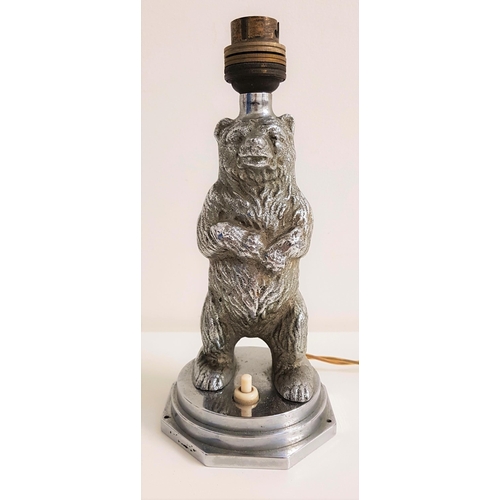 330 - ART DECO CHROME LAMP
modelled as a bear standing upright on a shaped base, 22cm high