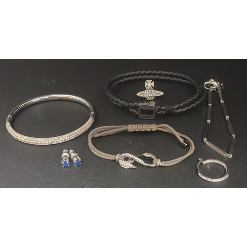 164 - SELECTION OF FASHION JEWELLERY
comprising a Boss leather bracelet, a DKNY bar chain bracelet, a sing... 