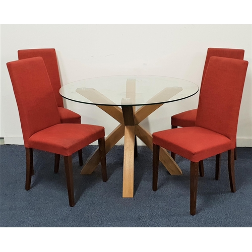 548 - CIRCULAR DINING TABLE AND CHAIRS
the with a glass top on an oak cross strut supports, 74.5cm x 110cm... 