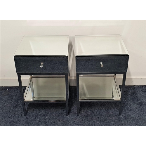 549 - PAIR OF MIRRORED BEDSIDE TABLES
with bevelled tops above a frieze drawer with a shelf below, standin... 