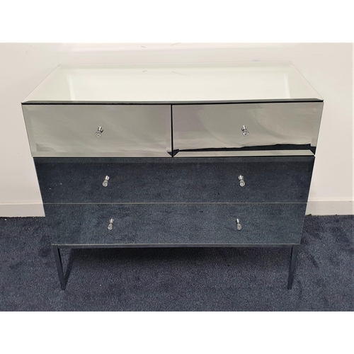 552 - LARGE MIRRORED CHEST OF DRAWERS
with a bevelled top above two short and two long drawers, standing o... 