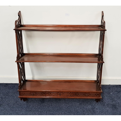 565 - SET OF MAHOGANY OPEN SHELVES
with three shelves, lattice work sides, and three drawers, 90cm x 74.5c... 