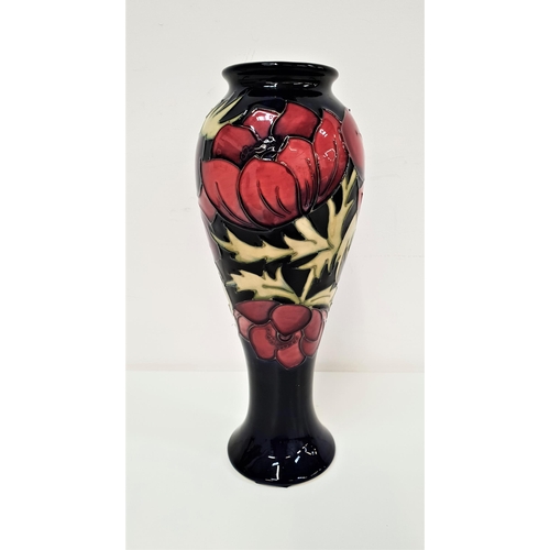 250 - MOORCROFT VASE
decorated with anemone on a blue ground, the base initials WM for William John Moorcr... 