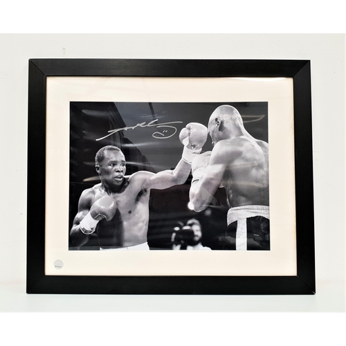 340 - SUGAR RAY LEONARD SIGNED PHOTO
in black and white, fighting and eventually beating Marvin Hagler, wi... 