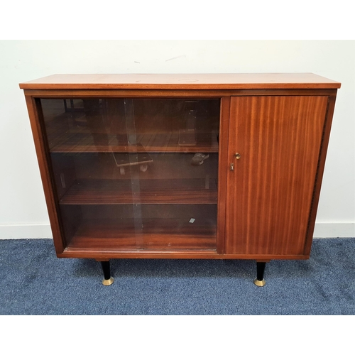 497 - 1960s MAHOGANY SIDE CABINET
with a pair of glass sliding doors with adjustable shelves and a cupboar... 