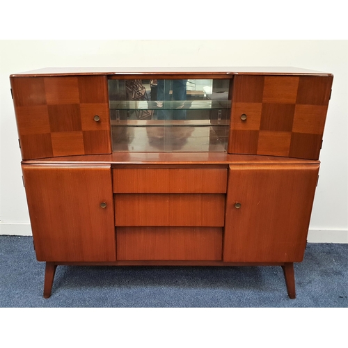 498 - BEAUTILITY MAHOGANY DRINKS CABINET
with a bow front above a pair of central glass sliding doors with... 