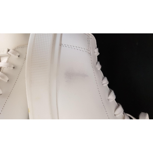 199 - PAIR OF BOSS LOW-TOP TRAINERS IN LEATHER 
with branded lace loop, size 10 
Note: there are some ligh... 