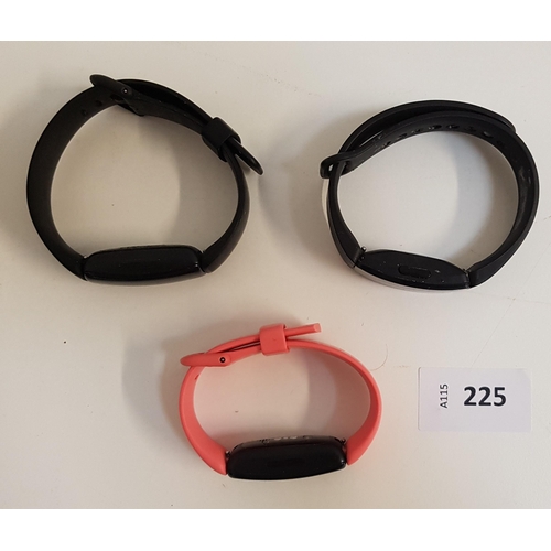 225 - SELECTION OF THREE FITBIT FITNESS TRACKERS 
comprising two Inspire 2 and a Inspire 
Note: It is the ... 