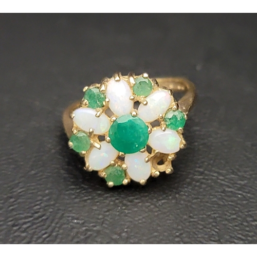 3 - PRETTY EMERALD AND OPAL CLUSTER DRESS RING
on nine carat gold shank, ring size K