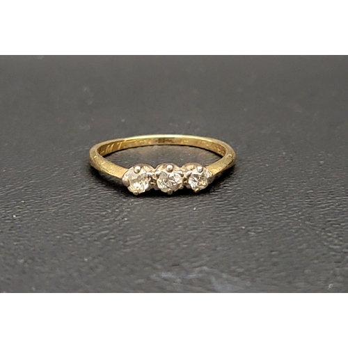 36 - DIAMOND THREE STONE RING
the diamonds totalling approximately 0.45cts, in eighteen carat gold and pl... 