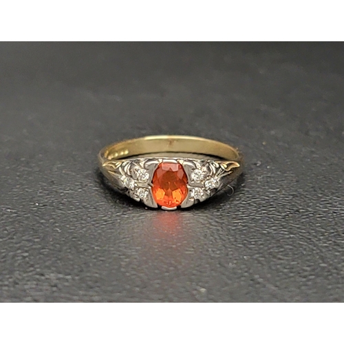 79 - PRETTY MEXICAN FIRE OPAL AND DIAMOND CLUSTER RING
the central oval cut Mexican fire opal measuring a... 