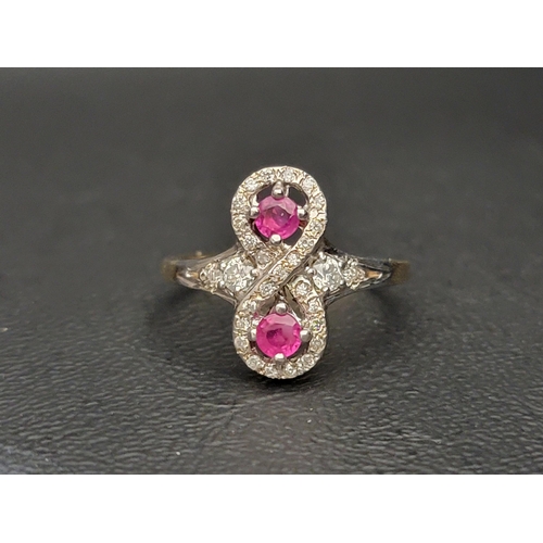 82 - UNUSUAL RUBY AND DIAMOND RING
the round cut rubies totalling approximately 0.30cts, within multi dia... 