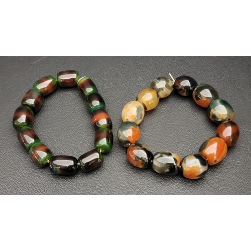 110 - TWO AGATE BEAD BRACELETS
each bracelet with twelve beads (2)