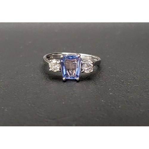 112 - SAPPHIRE AND DIAMOND THREE STONE RING
the central trapezoid cut sapphire approximately 1.4cts flanke... 