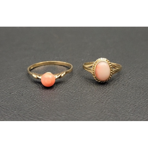 134 - TWO CORAL DRESS RINGS
both on nine carat gold shanks, ring sizes P-Q and J respectively, total weigh... 