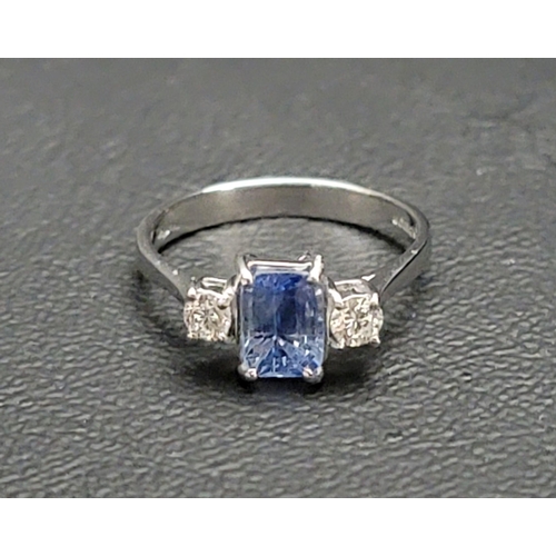 146 - SAPPHIRE AND DIAMOND THREE STONE RING
the central emerald cut sapphire approximately 0.8cts flanked ... 