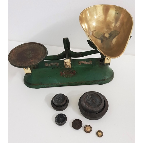 298 - J & J SIDDON SHOP SCALES
with green painted body, a circular weight platform and a shaped brass good... 