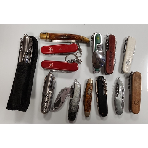 255 - SELECTION OF SWISS ARMY KNIVES AND KNIVES
of various sizes and design (15)
Note: You must be over th... 