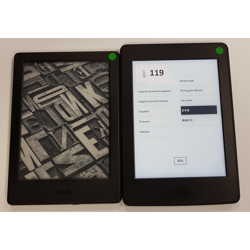 119 - TWO AMAZON KINDLE E-READERS
comprising a Paperwhite 3, serial number G090 G105 6302 0J8J; and a Basi... 