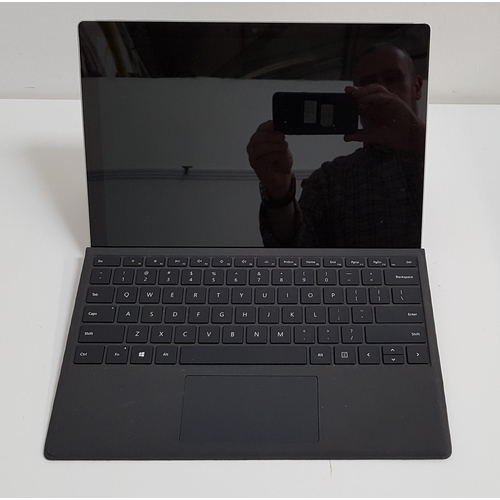 127 - MICROSOFT SURFACE PRO 7
model 1866; 128GB; serial number 006369494553; with keyboard cover; wiped.
N... 