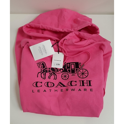 179 - NEW PINK COACH SWEATSHIRT
with tags; size Large