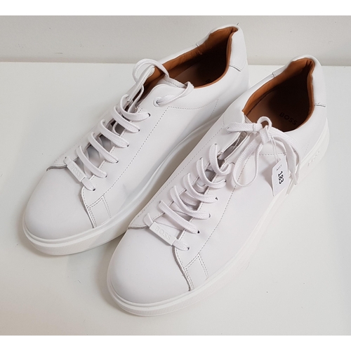 183 - PAIR OF BOSS LOW-TOP TRAINERS IN WHITE LEATHER 
with branded lace loop, size 10 
Note: there are som... 