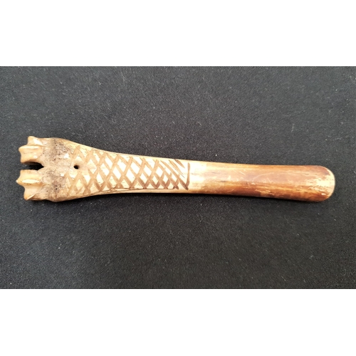 252 - 19th CENTURY CARVED BONE CHEESE SCOOP
with lattice style carved decoration, 14cm long