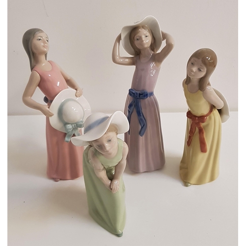 216 - FOUR LLADRO FIGURINES
comprising The Dreamer, 5008, 25cm high, Girl Trying On Hat, 5011, 26cm high, ... 